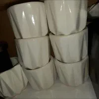 تعدادزیادی بطری شیشه ای،گلدان سرامیک وغیره