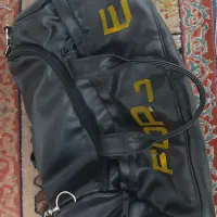 ساک مسافرتی و ساک ورزشی و حلقه ی ورزشی