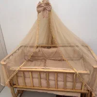 تخت خواب چوب مدل گهواره تا ۵سال