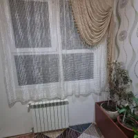 پرده توری همراه باوالان