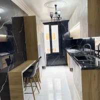۵۸ متر_۲ خواب_پارکینگ  و انباری_نما تراورتن_پونک