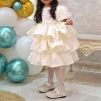 لباس مجلسی دخترانه همراه با کفش اشانتیون سایز 26