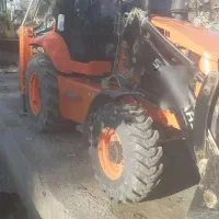 بیل بکهو سنوپارس ۲۵۰سی پاکت جلوی چهار کاره