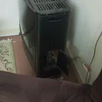 رگال و مانکن و چوب لباسی و بخاری و قفسه