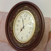 لباس مجلسی تاسایز ۴۸  و ساعت دیواری شیک