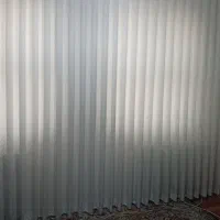 شستشوی تخصصی پرده همراه با باز و نصب