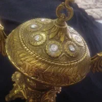 قو عاشق و شکلات خوری برنجی