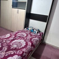 تخت‌ تاشو همراه با کمد و کتابخانه