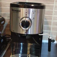 یه دستگاه اسپرسو ساز دلمونتی