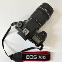 کنون ۷۰ دی و لنز 18 135