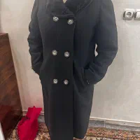 پالتو|لباس|مشهد, کوی ولیعصر|دیوار