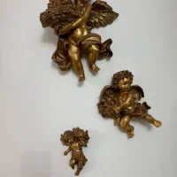 مجسمه و گلدان