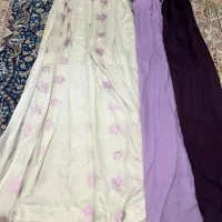 دو عدد پرده حریر گلدار همراه با والان