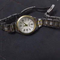 ساعت می زنانه