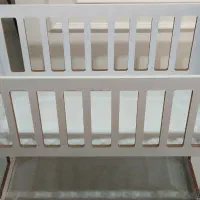تخت نوزادی کنار مادر