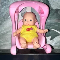 عروسک با تاب