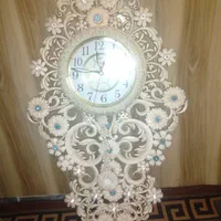 ساعت دیواری آونگ دار