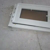 پنجره آلومینیومی با شیشه دودی