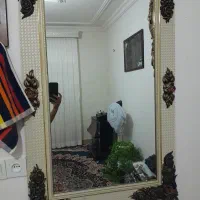 ساعت و آینه