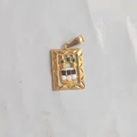 پلاک طلا 50 هزار بالای تابلو