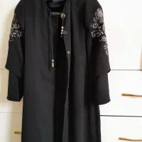 تعدادی مانتو وپالتو