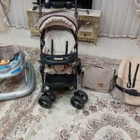 کالسکه و کریر و روروئک و ساک بچه کرم قهوه ای|کالسکه و لوازم جانبی|رباط‌کریم, مسکن مهر آبشناسان|دیوار