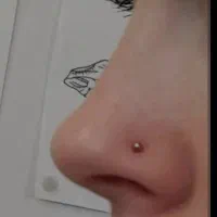 پرسینگ و از بین بردن خال وزگیل