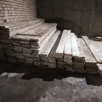 سنگ بنایی کارکرده تخته چوب بست