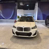 بی‌ام‌و iX1 eDrive 25L، مدل ۲۰۲۵ سفید تو قرمز|خودرو سواری و وانت|تهران, نیاوران|دیوار
