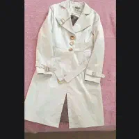 پالتو رنگ کرم شیری زخیم و نو