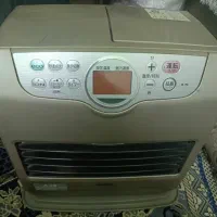 بخاری نفتی برقی مانیتور بزرگ