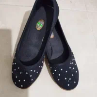 کفش نو|کیف، کفش، کمربند|قم, سنگ بند|دیوار