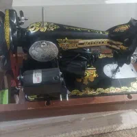 چرخ قدیمی|چرخ خیاطی و ریسندگی|شیراز, کوشک میدان|دیوار