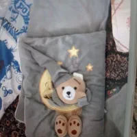 کریر و وسایل خواب و بالشت شیر دهی و آغوشی وکالسکه