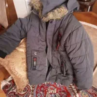 کاپشن رنگ طوسی برای ۷ یا ۸ ساله