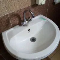 تعدادی شیر آلات احرمی روشویی و توالت و ظرفشور