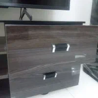میز تلوزیون ۴ کشو صفحه شیشه طول ۱۵۰عرض۴۰ سانتی متر