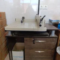 پرینتر و کاتر و سیستم و میز و صندلی