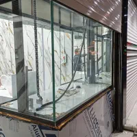 شیشه سکوریت،نرده استیل،کرکره برقی عدنان الماسی|خدمات پیشه و مهارت|سنندج, |دیوار