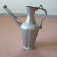 آفتابه مسی و تلویزیون آنتیک.فروشی