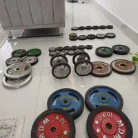 وزنه و دمبل و میز هالتر