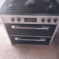 یک عدد کمد لباس واجاق گاز