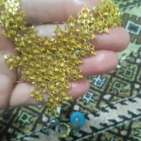 مدال و چند عدد دور گردنی و انگشتر و و