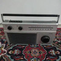 رادیو سوئیسی|کلکسیون اشیاء عتیقه|تربت جام, نظامی|دیوار