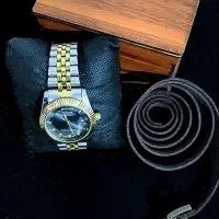 ساعت رولکس صفحه مشکی بند نقره‌ای + دستبند