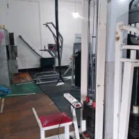 دستگاه جلو ران،ساق پا ایستاده،لت سیم کش(زیربغل)|تجهیزات ورزشی|کنگاور, |دیوار