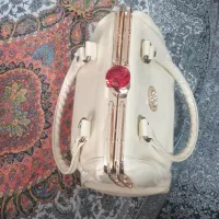 کیف مجلسی|کیف، کفش، کمربند|رباط‌کریم, رباط‌کریم|دیوار