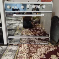 اجاق گاز و میز ال سی دی