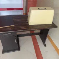 چرخ خیاطی و میز آن