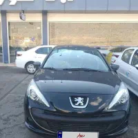 207 اتومات tu5pسقف شیشه ای صفر 1404 مشکی